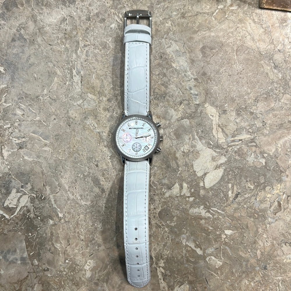 Michael Kors Watch, White Genuine Leather Band. Gently used watch with New Band.